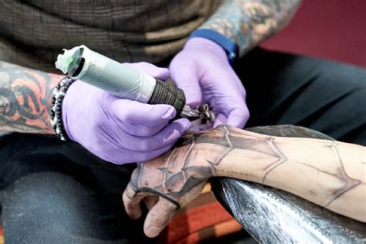 Are hand tattoos unprofessional?