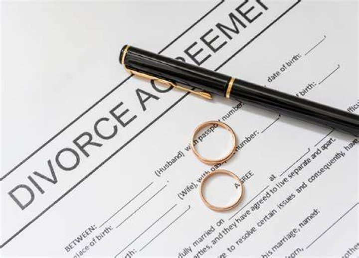 Can my ex wife give my last name to her child that she had with some other man and after our divorce?