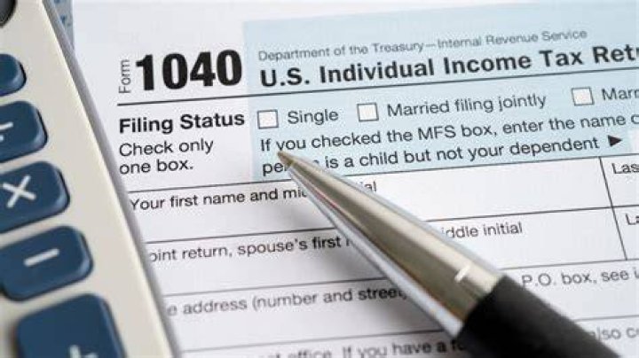 How do you file taxes if you are not married but living together?