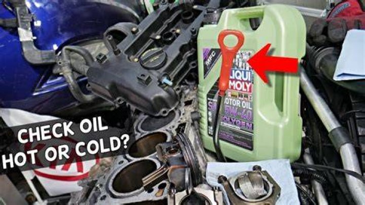 Is it better to change your oil hot or cold?